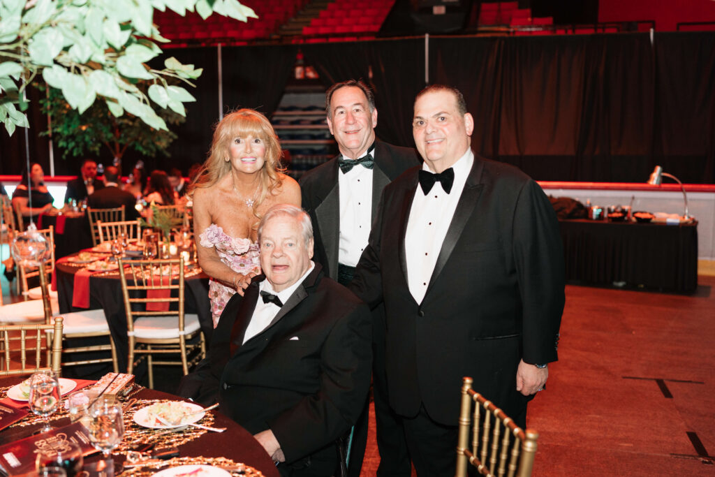 Harold "Tom" Clark with guests at the 1958 Gala